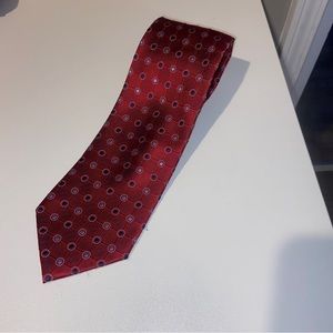 Jos. A. Bank silk tie red blue dots.